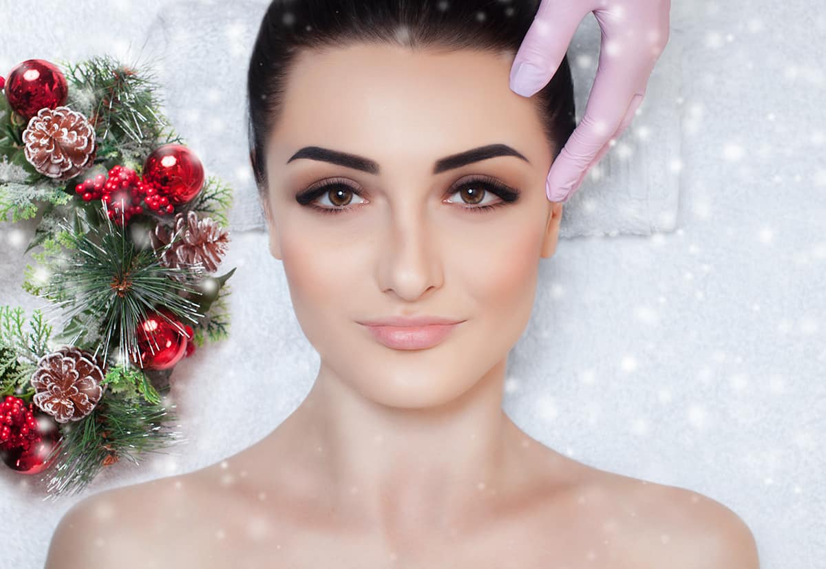dermal fillers; woman's face looks beautiful for the holidays