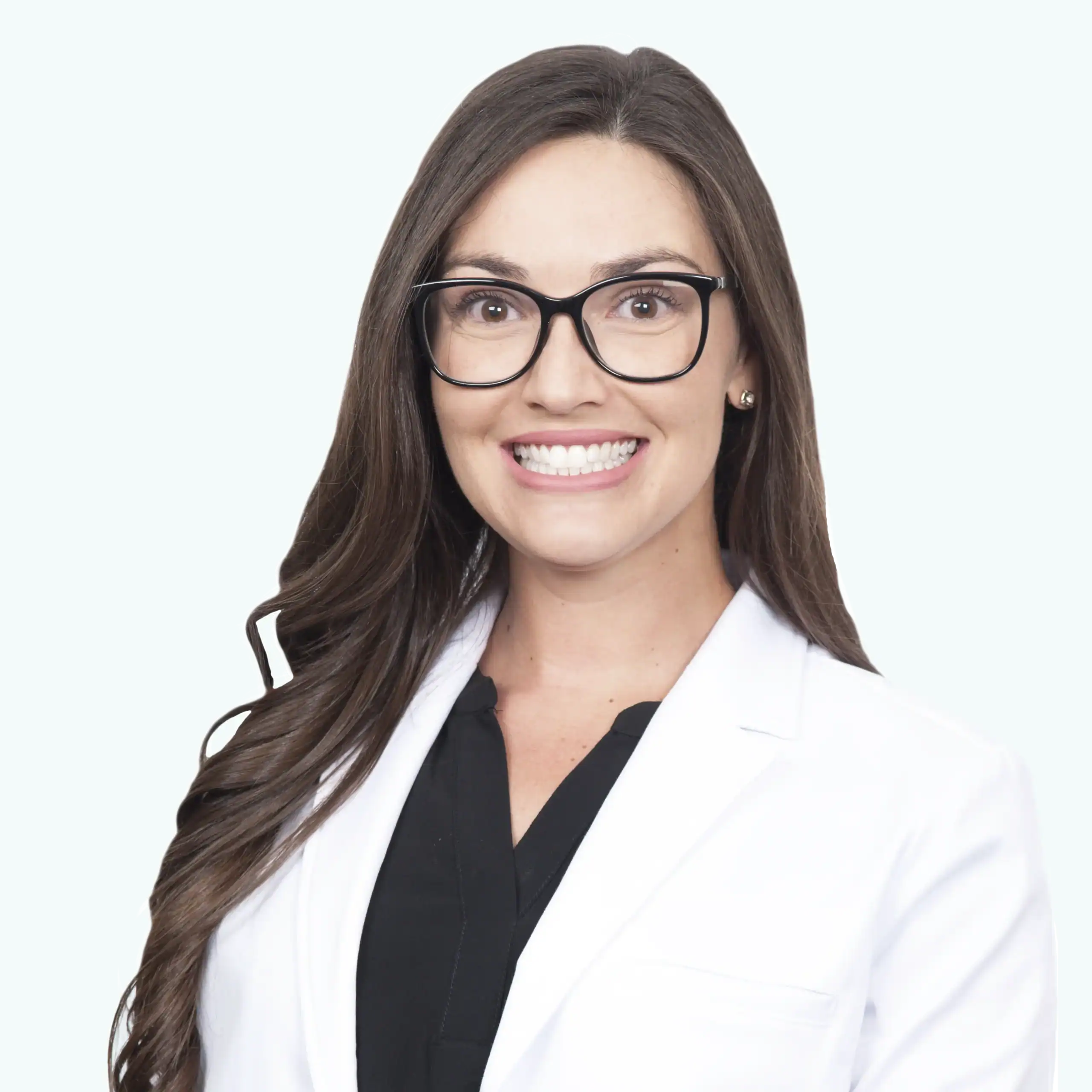 Allyson Deziel, MD, plastic surgeon at Aqua Plastic Surgery, wearing a white lab coat