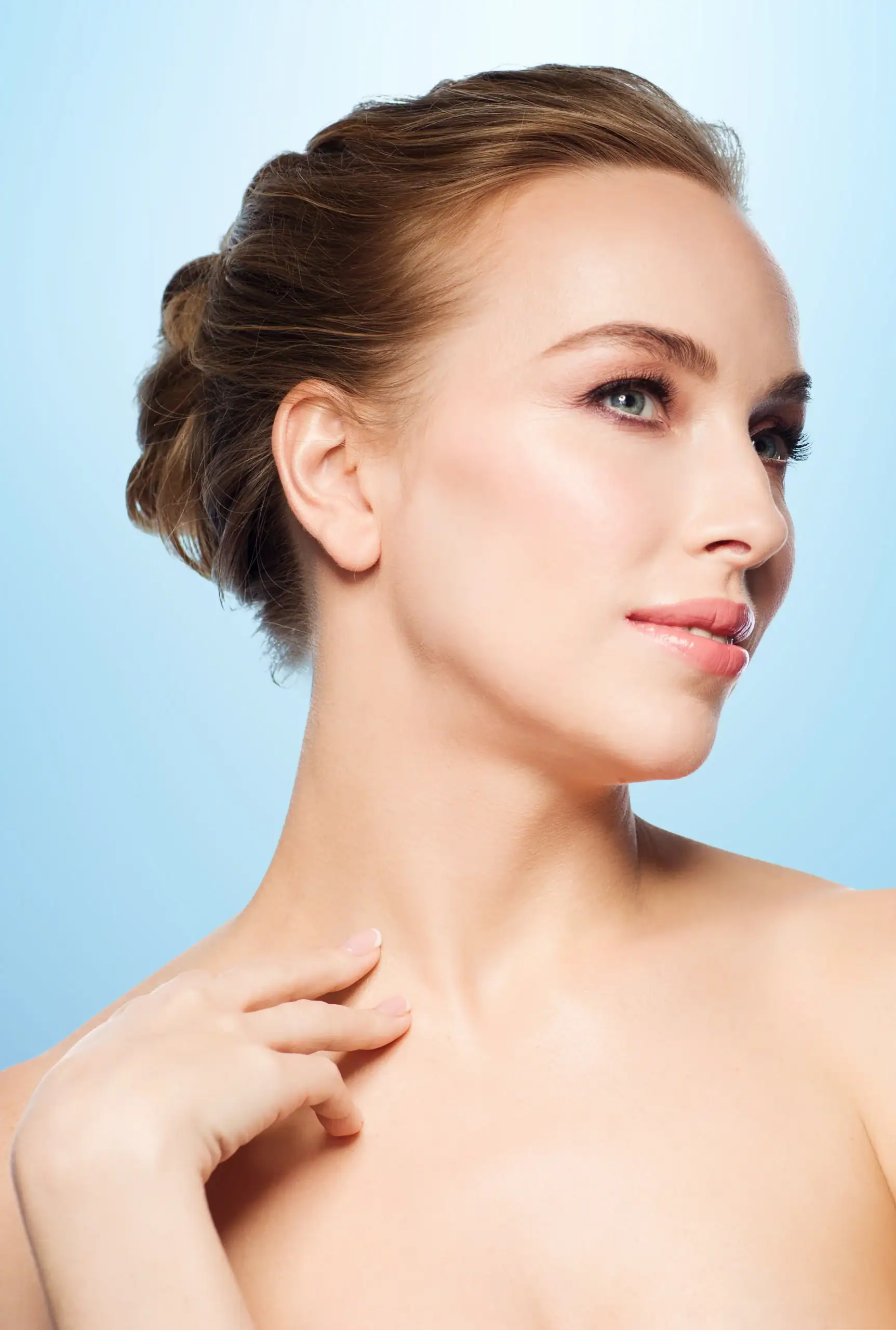 Woman with smooth skin and neck and light brown hair