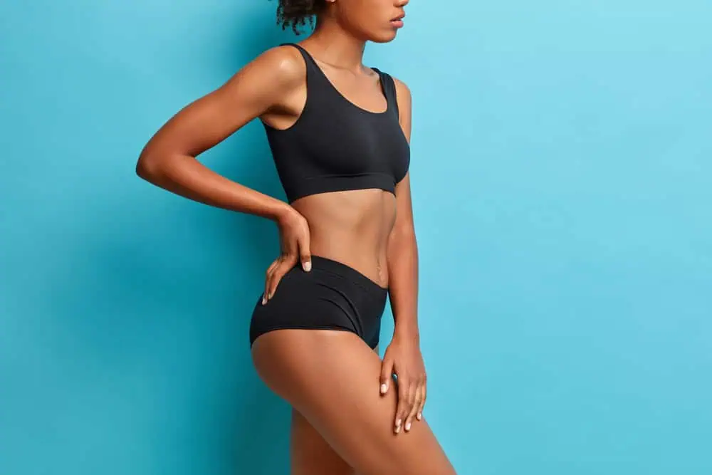 Athletic woman in a sports bra and bottom