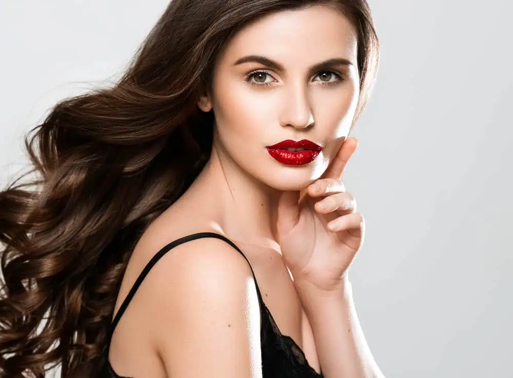 Picture of woman with red lipstick and a black dress